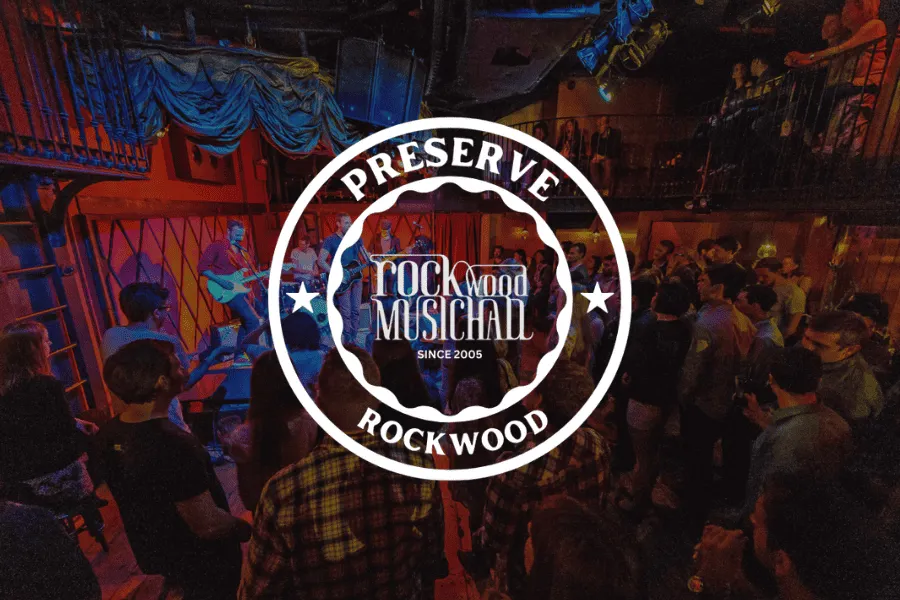 Save the Music Preservation Rockwood live concert at Rockwood Music Hall with an artist performing on stage and an audience e