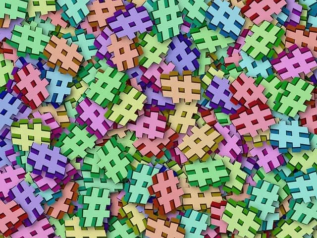 Hashtag-shaped colorful puzzle pieces scattered randomly, vibrant and visually engaging, symbolizing social media, digital co