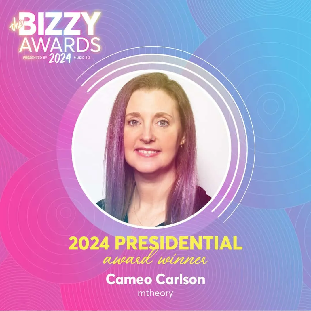 Award-winning music industry artist Cameo Carlson at the 2024 Bizzy Awards, showcasing her recognition as a 2024 Presidential