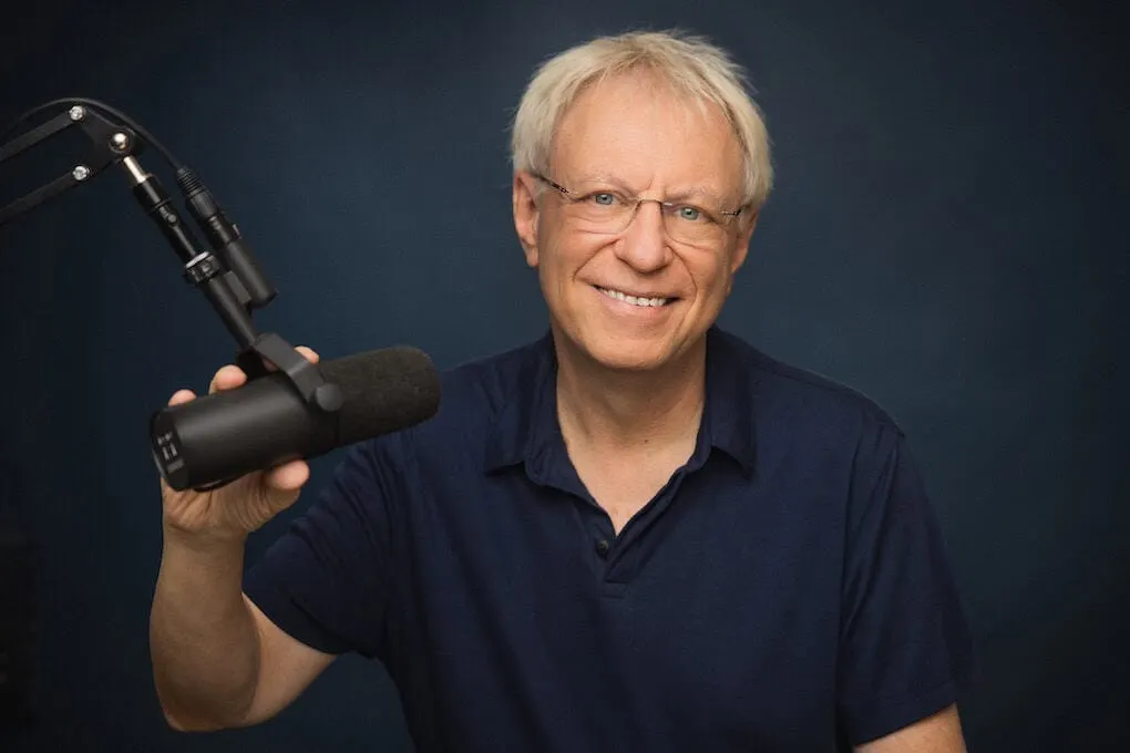 Popular music industry podcast host with microphone in recording studio for music industry insights and digital marketing str