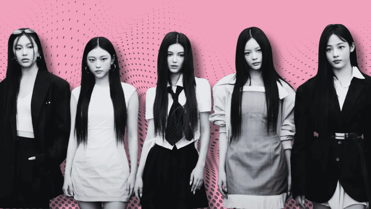 Stylish K-pop girl group members in black and white outfits with a vibrant pink pop art background, showcasing trending music