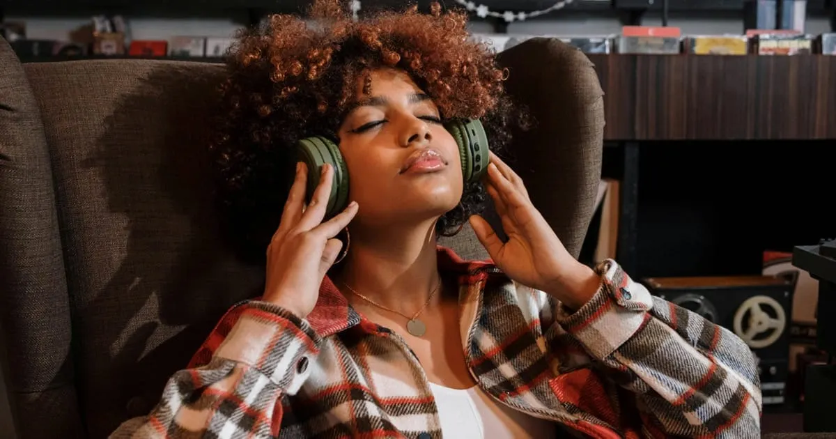 woman on headphones listening to music