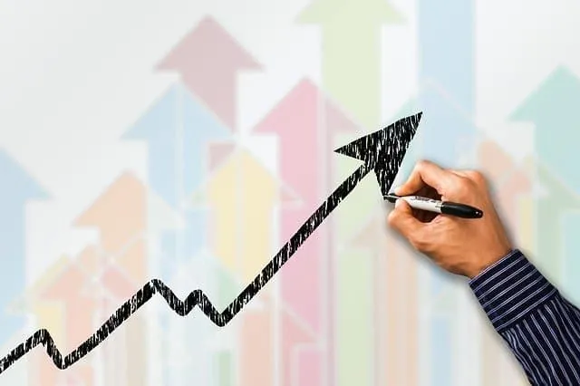 Increasing business growth with upward trending arrow chart on whiteboard, emphasizing marketing analytics and strategic plan