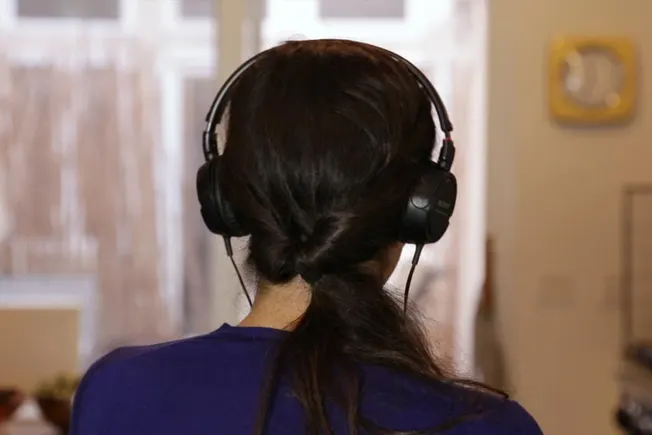 Headphones on woman listening to music or podcast, music technology, audio equipment, lifestyle, casual indoor setting, Hypeb