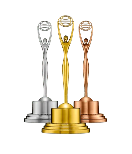 Elegant award statues in silver, gold, and bronze on a podium, symbolizing achievement and excellence in the music and entert