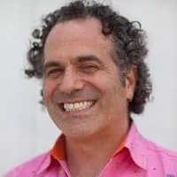 Hypebot logo with a smiling man in colorful shirt, representing music industry news and digital marketing insights.