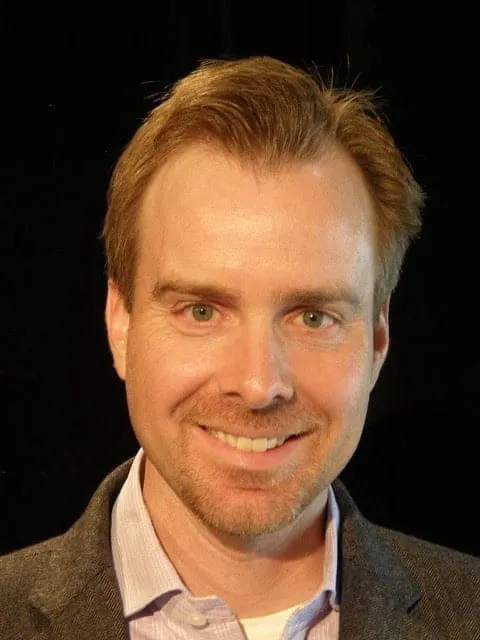 Professional male speaker at Hypebot music industry conference, discussing digital media trends and music marketing strategie