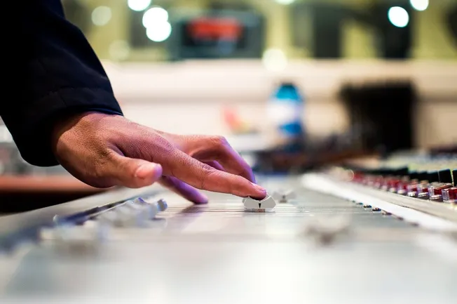 Mixing console audio control in a recording studio for music production, professional sound engineering, music industry, audi