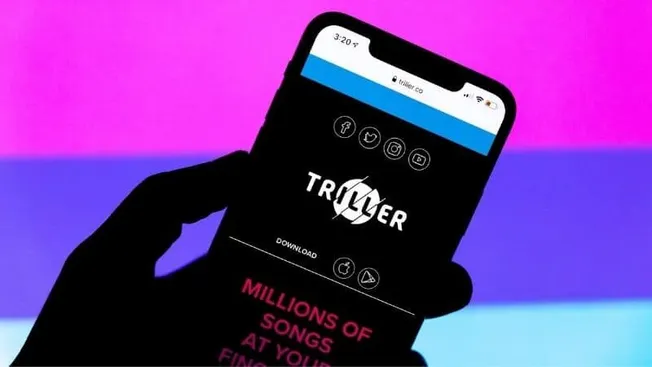 Triller app on smartphone screen, music streaming platform for discovering and sharing songs, social media integration, digit