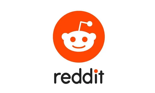 Reddit logo with orange circle and white alien face, representing popular social media platform for discussion and user-gener