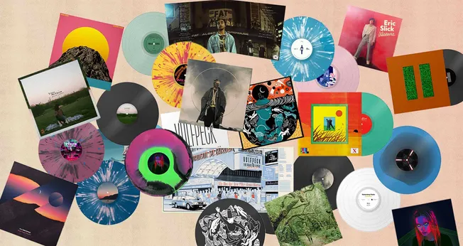 Colorful collection of vinyl records and album covers featuring diverse artwork and music genres, showcasing vinyl culture an