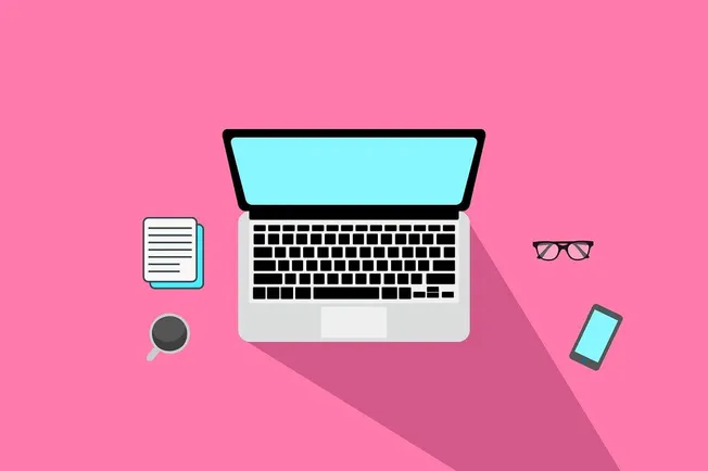 Laptop with keyboard and screen on pink background, office workspace, digital device, modern technology, workspace gadgets.