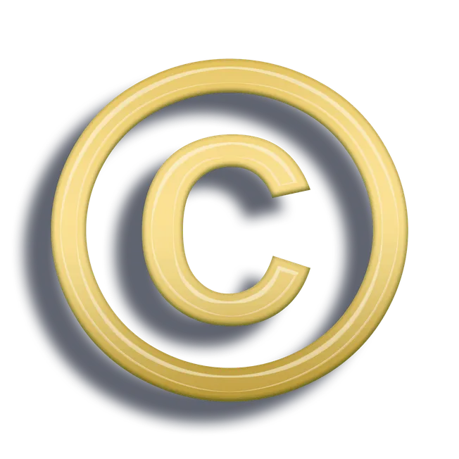 Copyright symbol in gold with black shadow background.