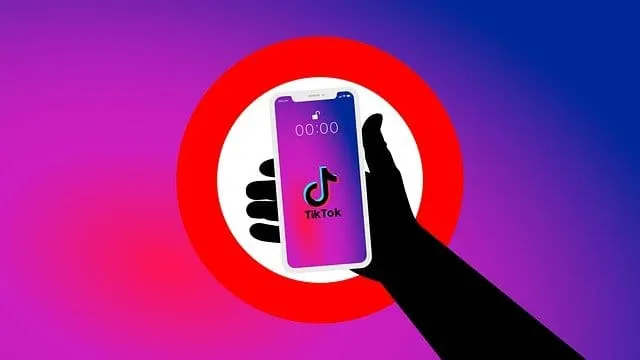 TikTok app on smartphone screen, digital entertainment, social media, trending music, video sharing platform, mobile device,
