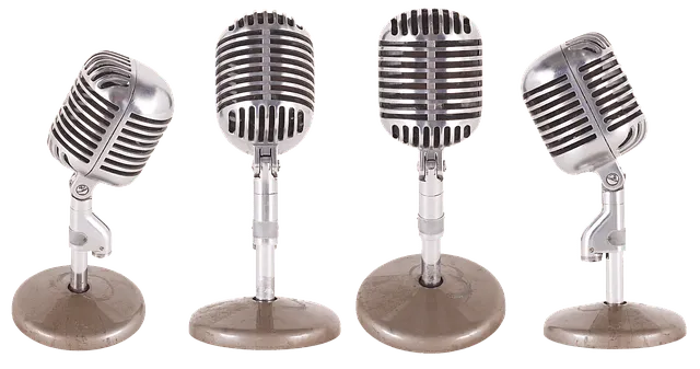 Vintage microphones on a stand, used for radio broadcasting and music performances, representing audio technology and live so