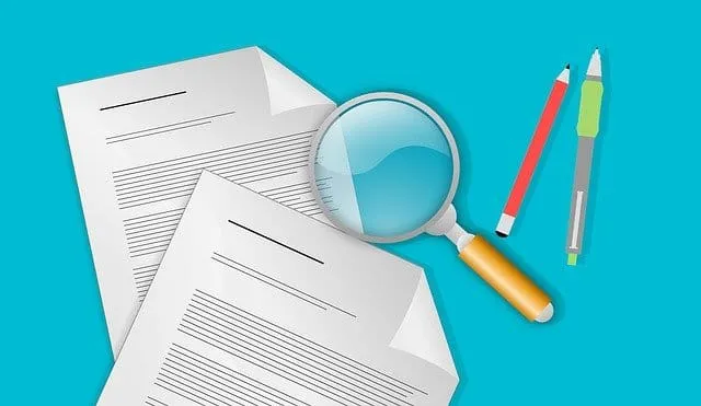 Analysis of music industry reports with magnifying glass and documents for market research and insights.