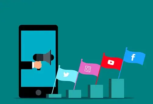 Mobile device with a megaphone, surrounded by social media platform flags including Facebook, Twitter, Instagram, and YouTube