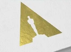 Long abstract gold and white paper cutout of an Oscar statuette on a white background, symbolizing achievement and recognitio