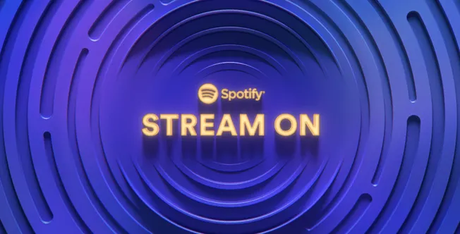 Spotify streaming icon with neon text "Stream On" on a vibrant purple and blue circular background for music streaming promot