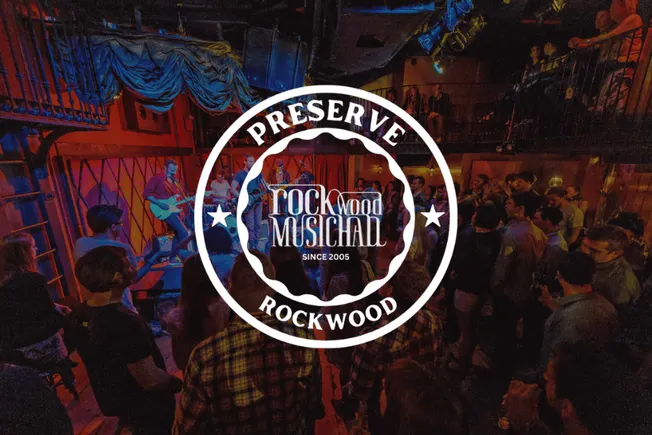 Save the Music Preservation Rockwood live concert at Rockwood Music Hall with an artist performing on stage and an audience e