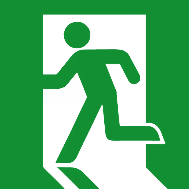 Emergency exit sign with running figure, green background, safety symbol, indoor safety signage, emergency evacuation indicat