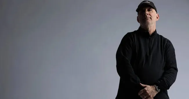 Innovative music industry expert in black attire posing confidently for Hypebot article on music marketing and industry trend