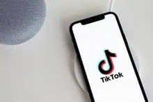 TikTok logo displayed on a smartphone screen, highlighting social media trends and digital marketing on the popular video-sharing platform.