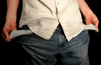 A person adjusting their jeans, casual style, close-up of hands and clothing, emphasizing fashion and lifestyle.