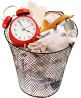 A messy trash can filled with crumpled paper, envelopes, and discarded items, representing clutter or waste.