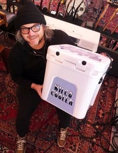 Wild cool golden record player with custom label, vibrant and stylish music accessory for vinyl enthusiasts.