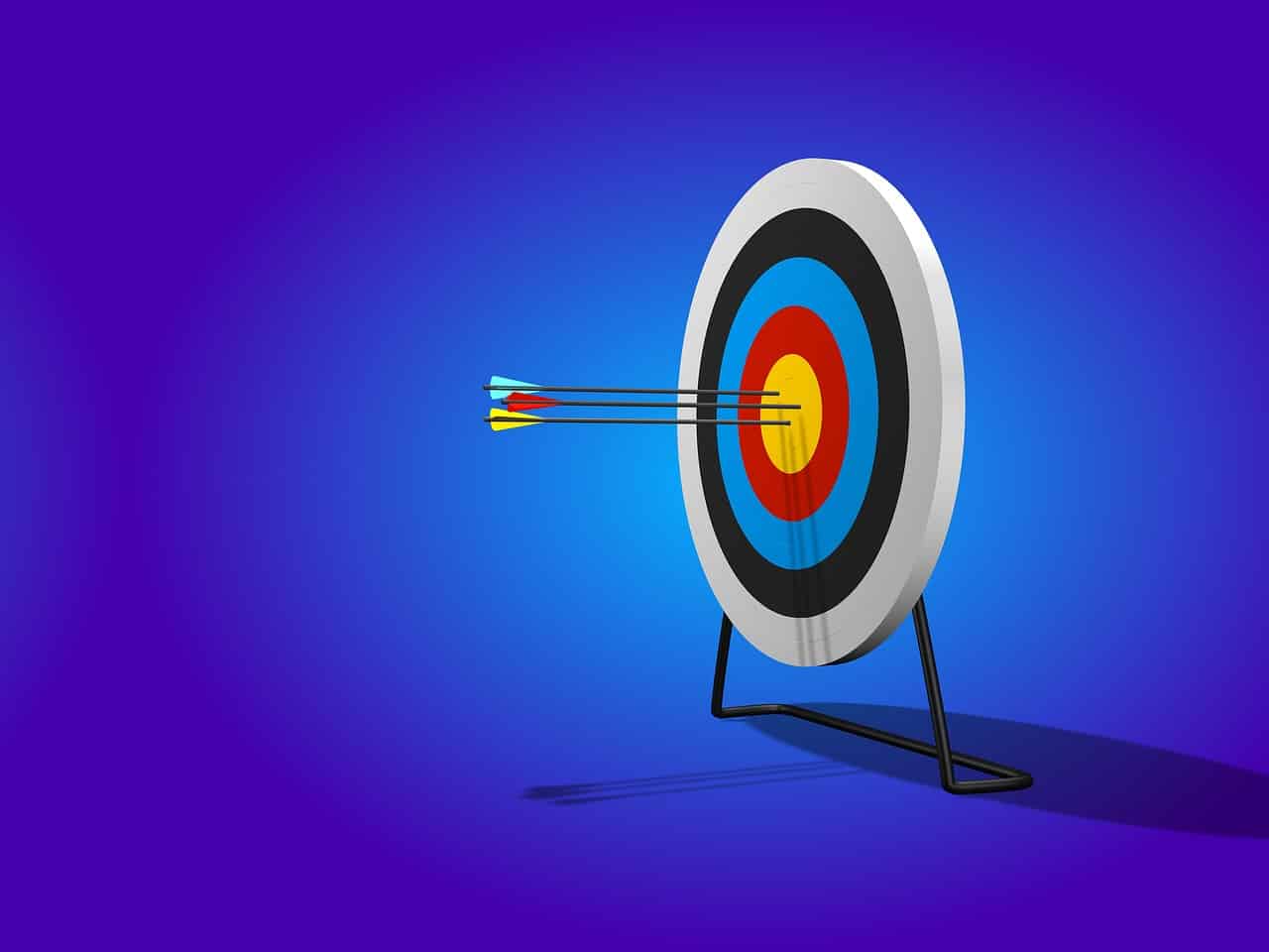 Target mental health awareness with a vivid digital illustration of a bullseye target with arrows hitting the center, symbolizing focus, precision, and goal achievement in mental health campaigns.