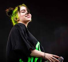 Indie musician performing on stage at Hypebot music industry event, highlighting live music, concert, and artist branding in the digital age.