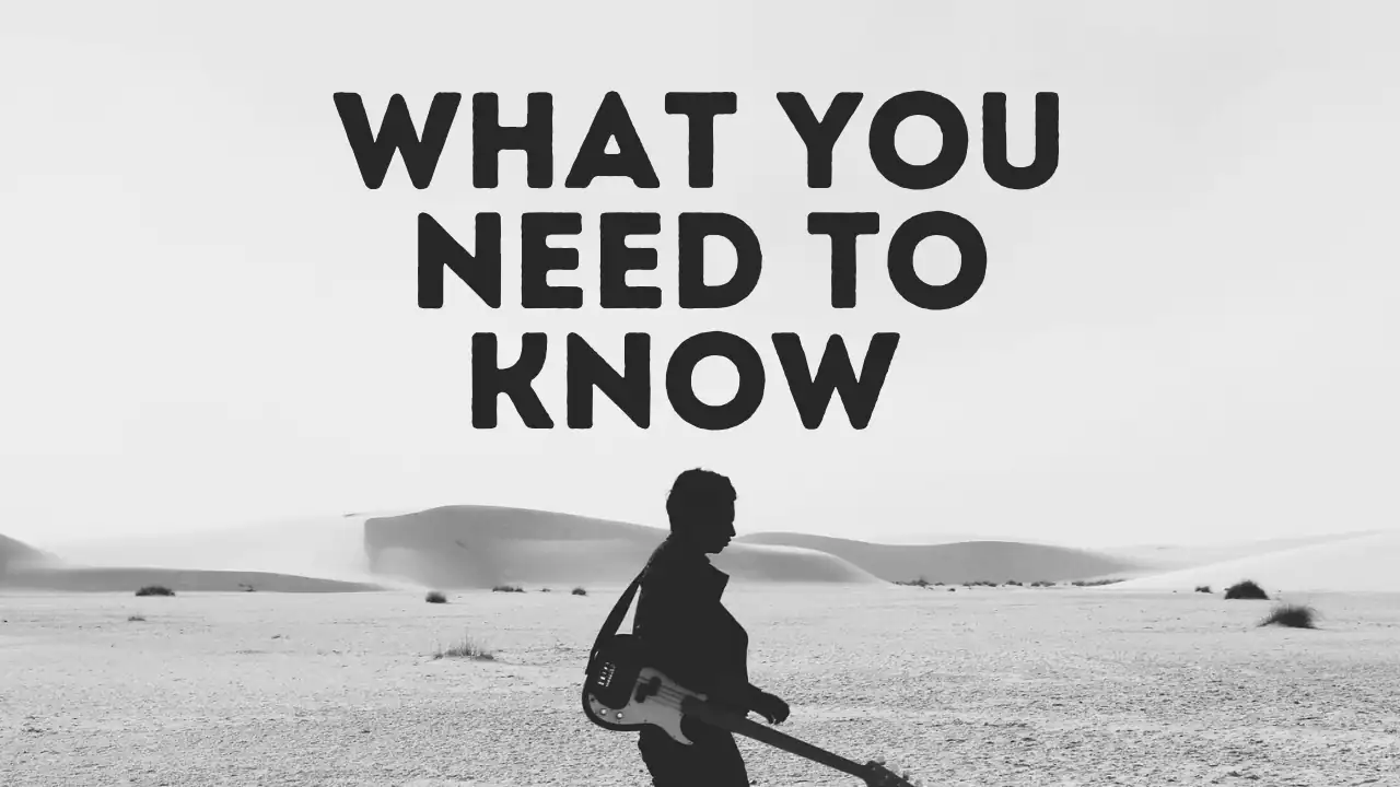 Bold black text on a minimalist desert background with a silhouette of a person holding a guitar, emphasizing motivational and inspirational messages about music and creativity.