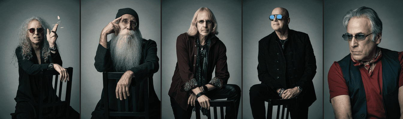 Hypebot, rock band portrait, legendary musicians of classic rock, musicians with vintage style, music icons in studio setting, alt text for music industry image, promotional image of iconic rock band members, description of legendary artists posing for promotional photos, vintage and modern fashion styles blended, music industry professionals captured in high-quality studio photo, relevance: high.