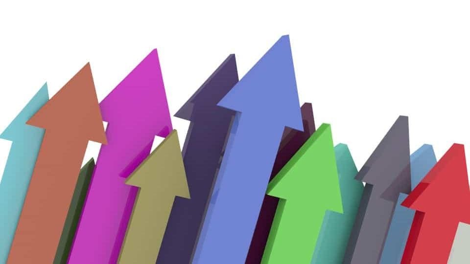 Upward trending colorful arrows representing music industry growth and digital marketing success for music brands and artists.