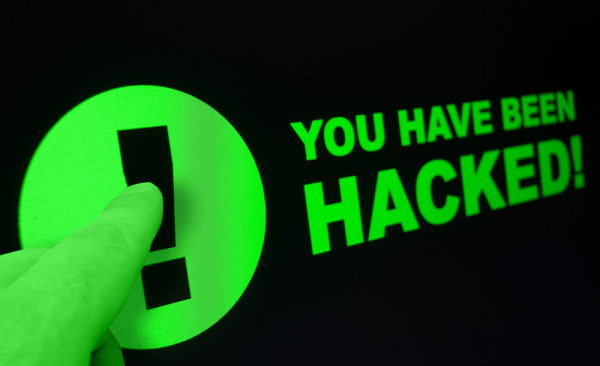 Alert screen showing "You Have Been Hacked" message with a finger pointing at an exclamation mark icon.