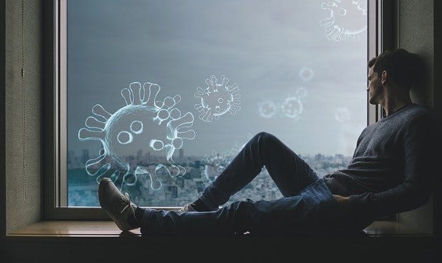 Virus icons floating outside window, man looking out contemplatively during pandemic, digital infection concept, mental health and isolation, COVID-19 impact on daily life, pandemic awareness, modern urban setting, health crisis reflection, creative image for COVID-19 topics, emotional resilience during health emergencies.