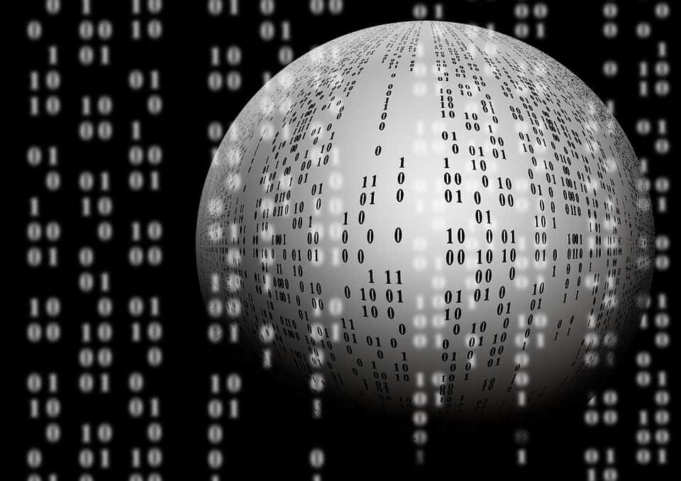 Digital data globe with binary code representing technology and digital information.