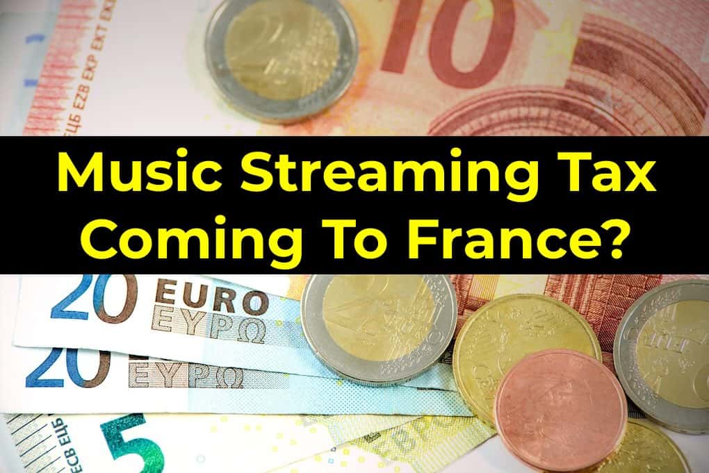 Euro and euro coins with 10 and 20 euro banknotes, illustrating potential music streaming tax implications in France.