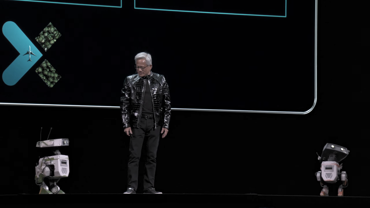 Jensen Huang at CES 2026 with BD-1 droids