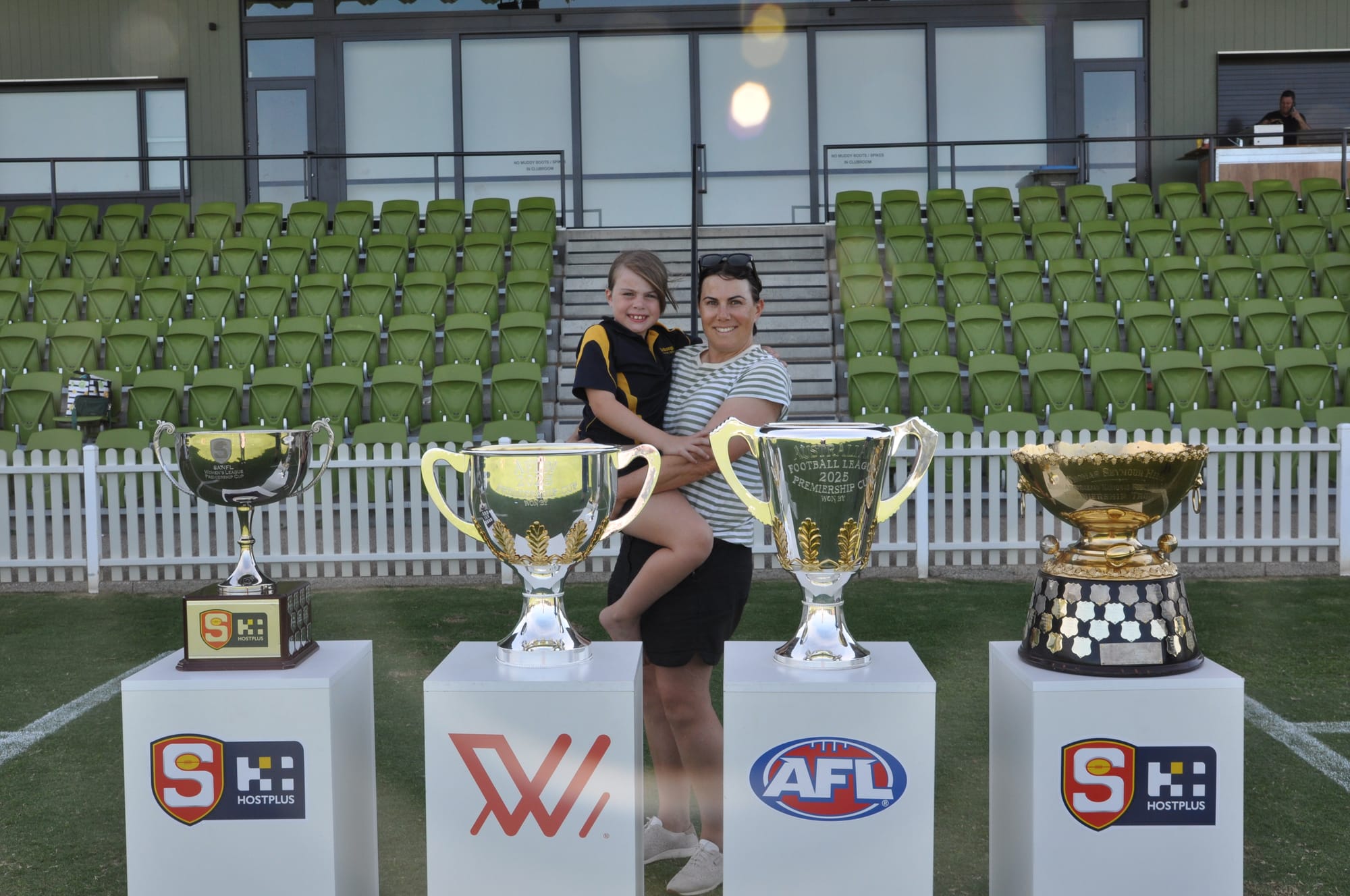 Locals get up close and personal with footy silverware