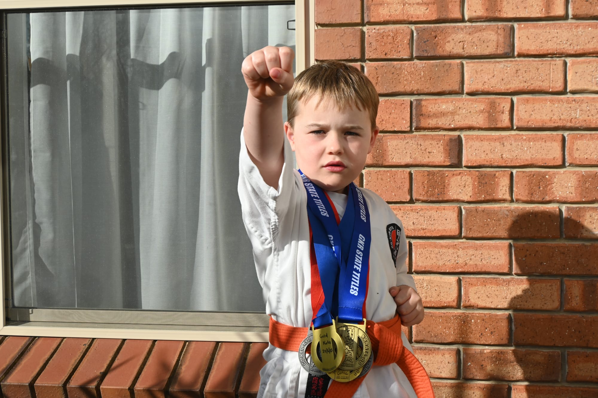 Elliot kicks his way to victory