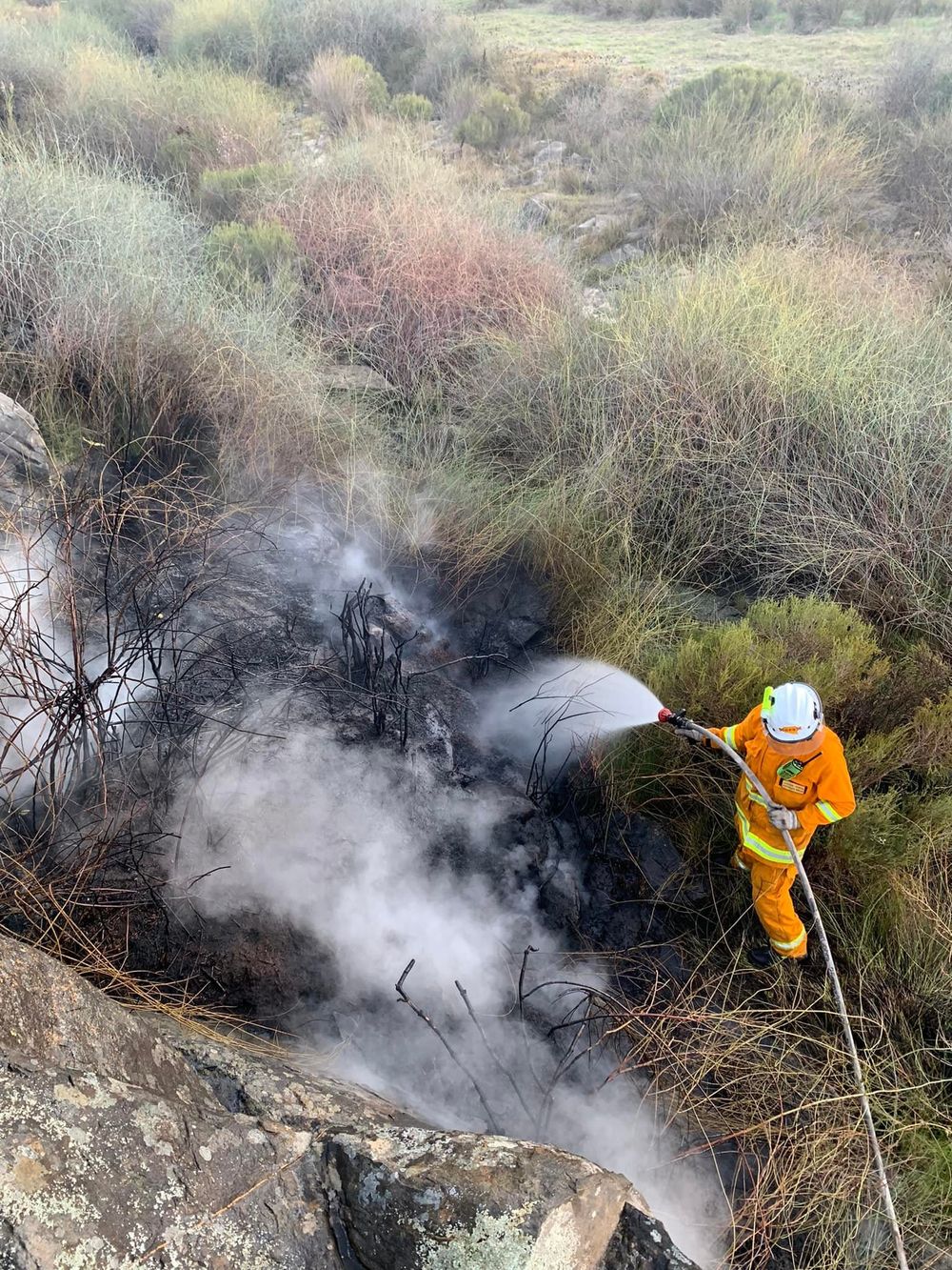 Grass fire near Hartley challenges local firefighters due to difficult terrain post image
