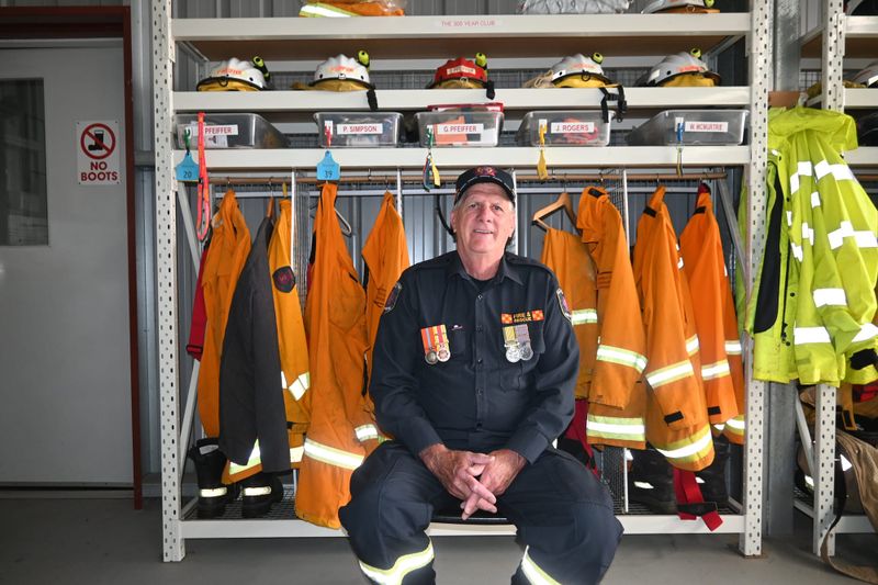 Volunteer credits milestone to family post image