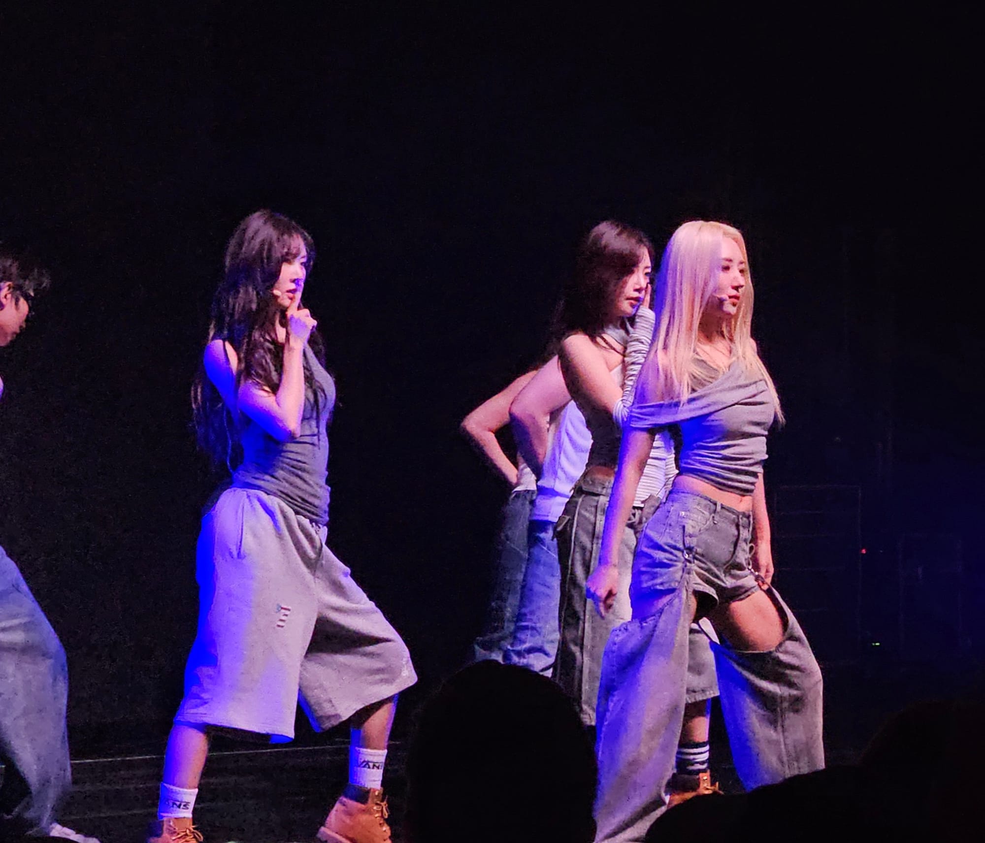 Yoohyeon, JiU, and SuA with the ending pose for their song "2 Months".