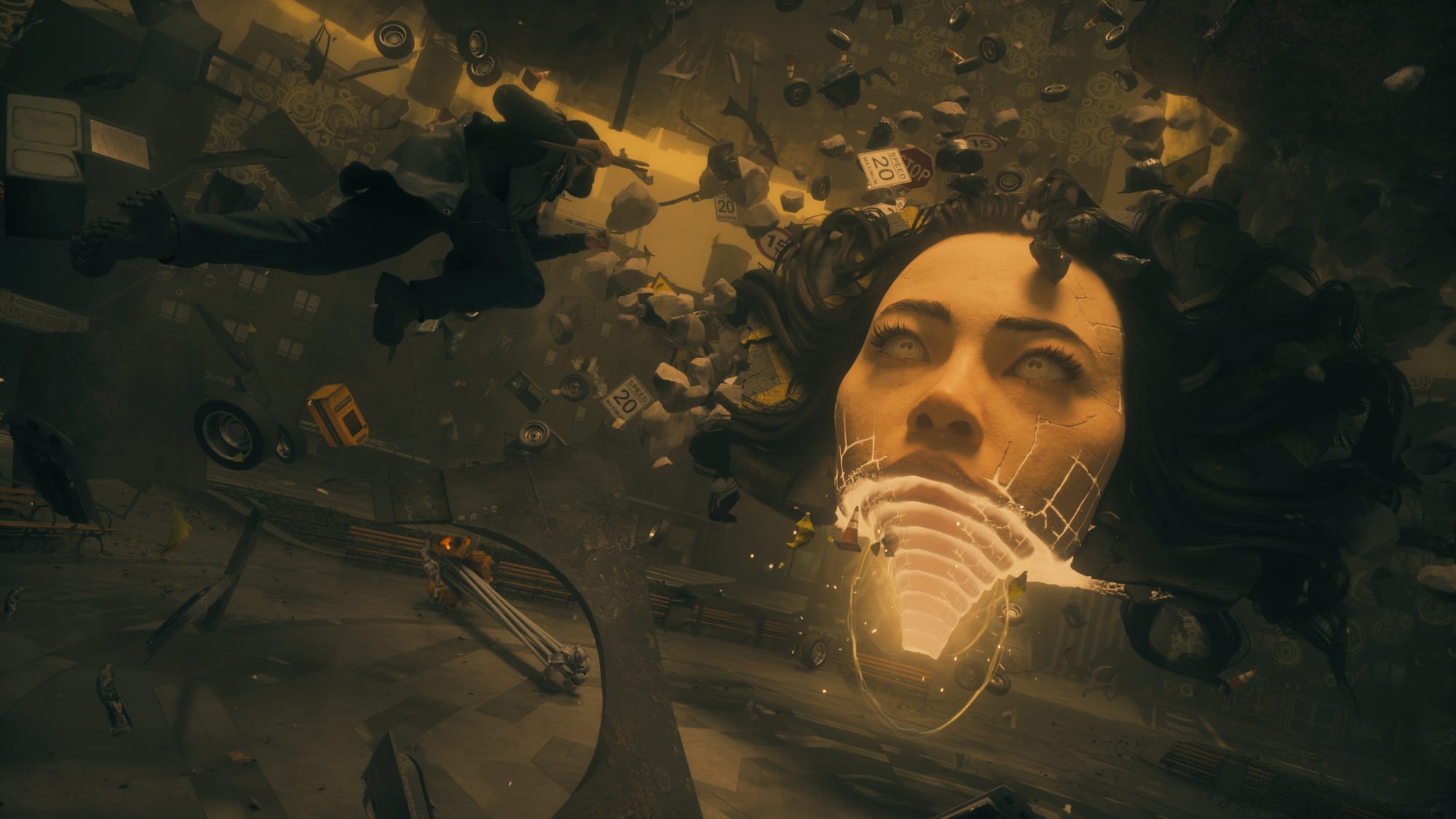 Dylan launches himself at The Artist, a giant face with debris flying out of it.