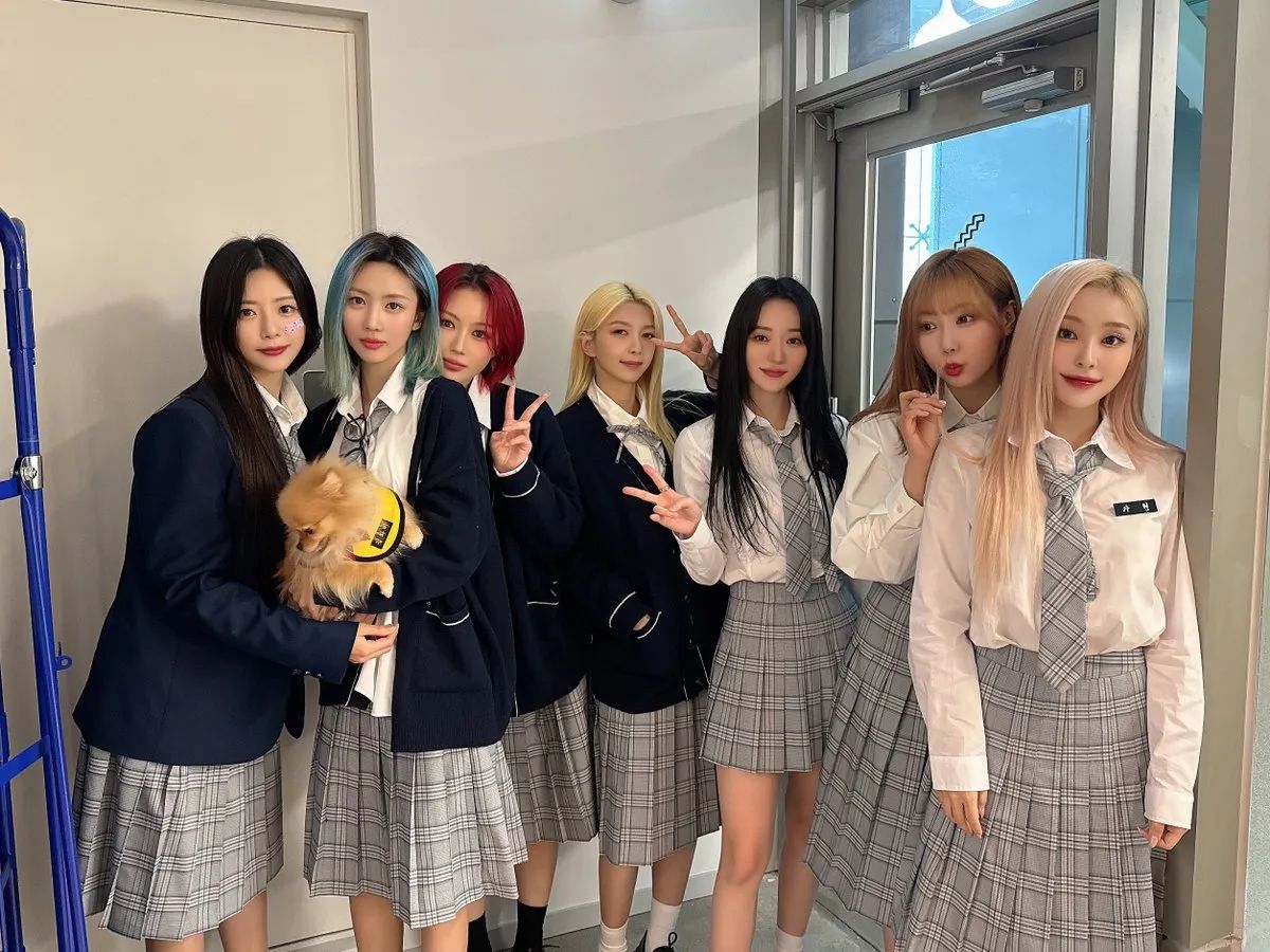 Dreamcatcher in school uniforms against a white background.