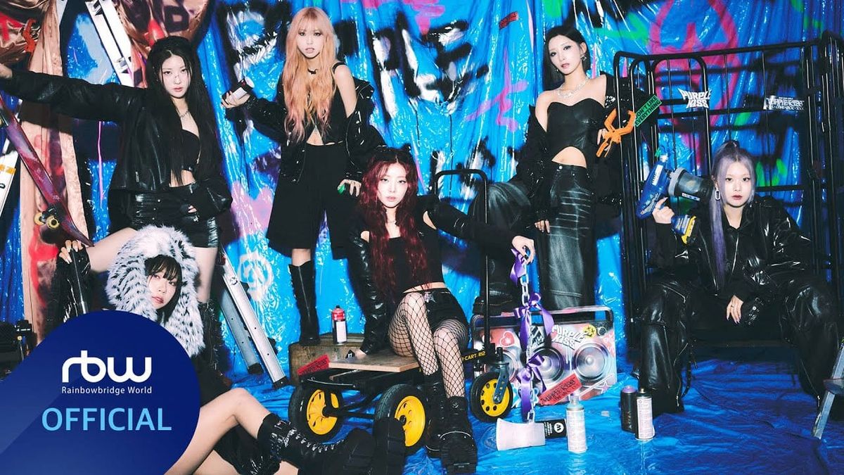 Members of Purple Kiss pose for the camera dressed in black against a brightly-colored graffiti background.