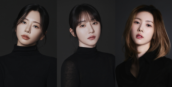 Photo headshots of Dreamcatcher's JiU, SUA, and Yoohyeon in black