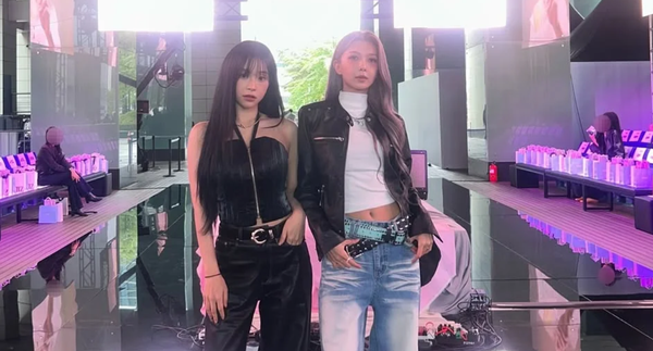 Dami and Gahyun dressed in black, white, and denim blue for the C. at Wrk Global Trend Festa.
